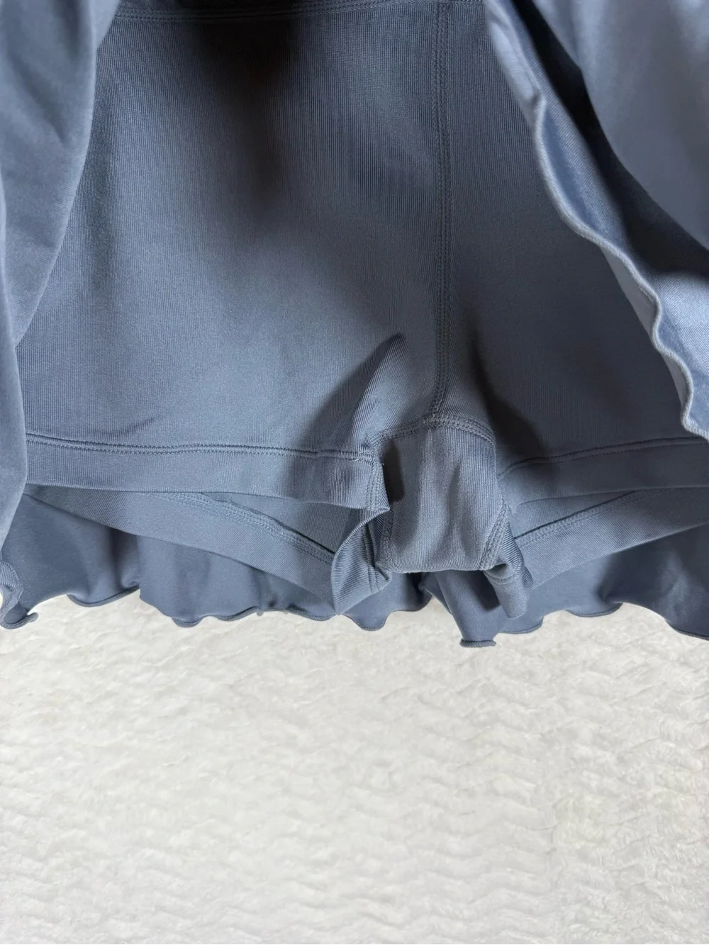 Nike Women's Gray Ruffle Tennis Skort with Contrast Trim. Look good on the court